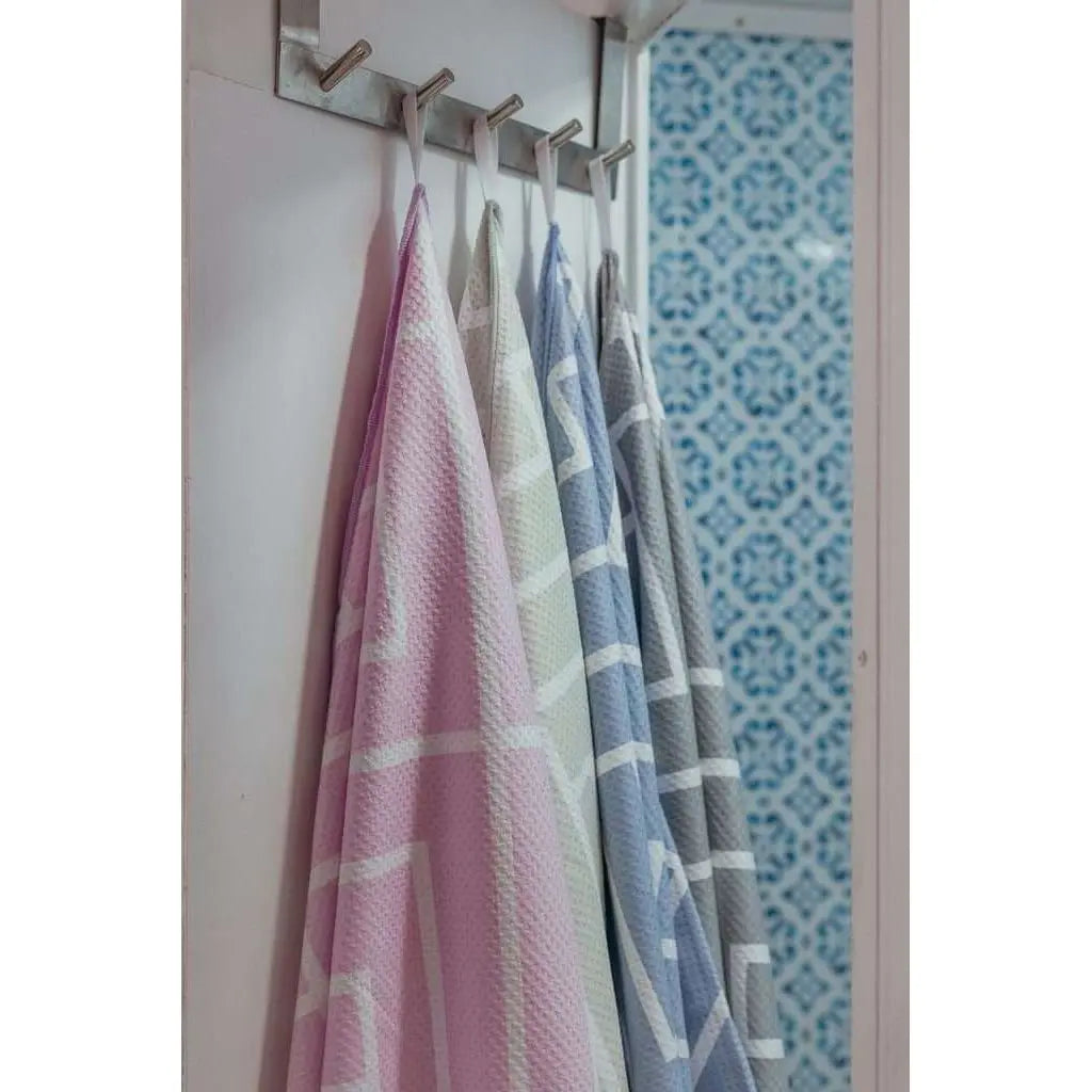 newlyfe towel hanging in bath room