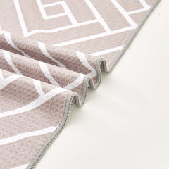 Close-up of sandstone waffle-weave microfibre bath towel